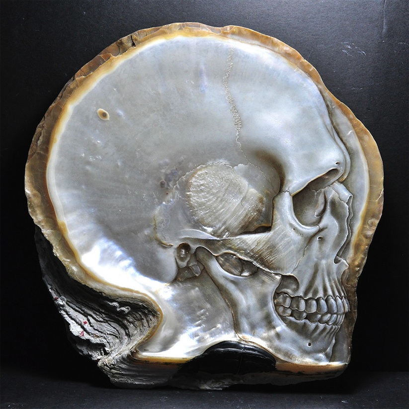 Skulls_Carved_into_Mother_of_Pearl_Shells_by_Gregory_Halili_2014_06